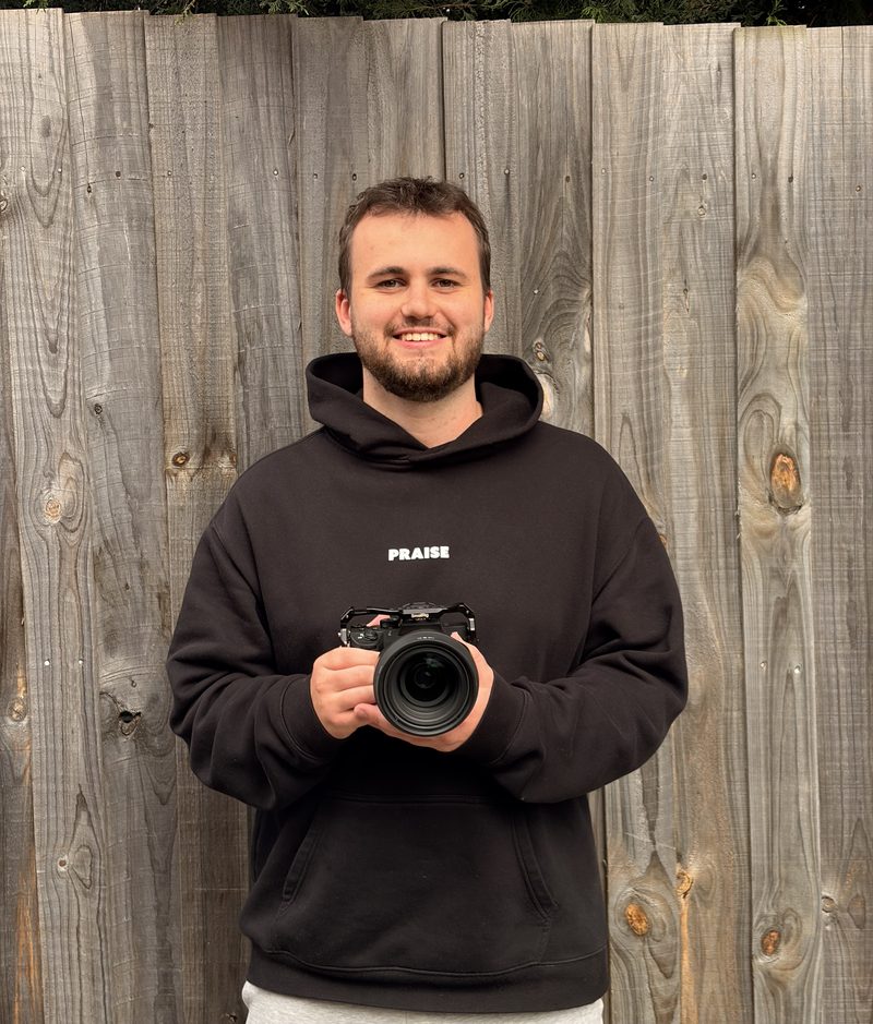 Brooklyn Owen, Melbourne videographer, holding a camera
